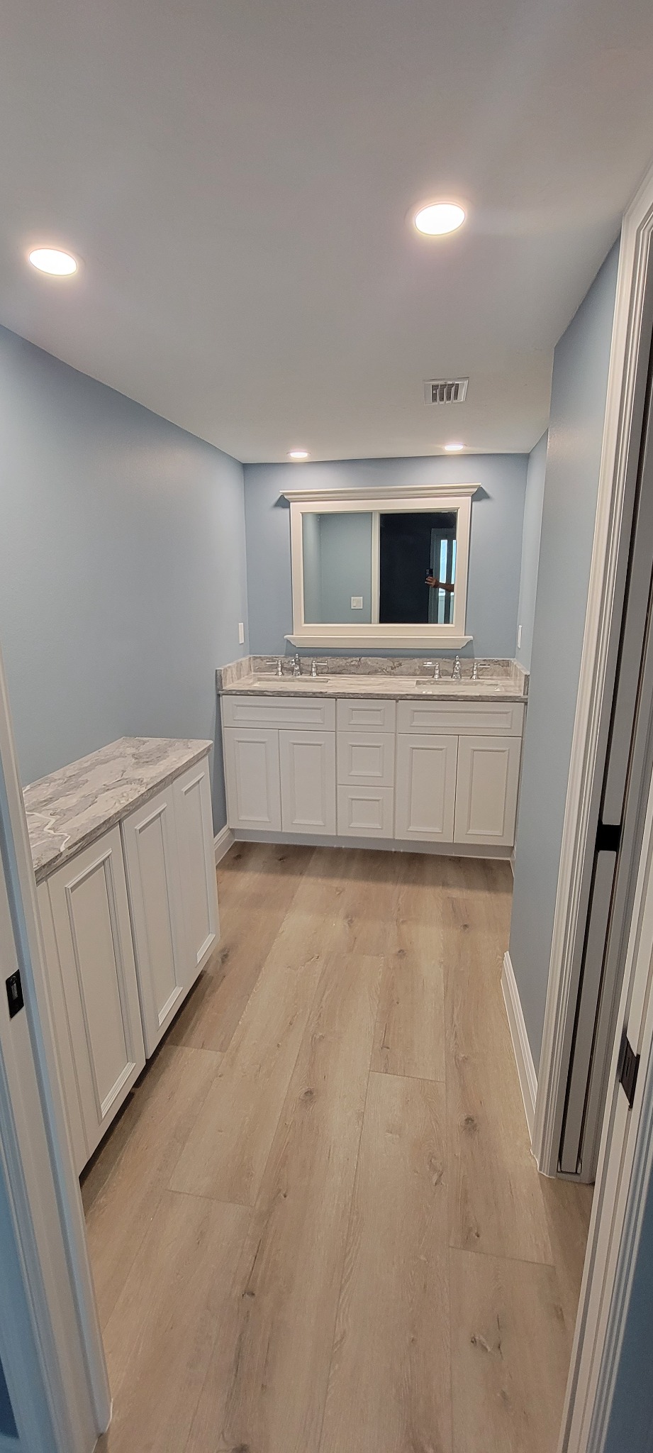 Completed bathroom vanity and cabinetry
