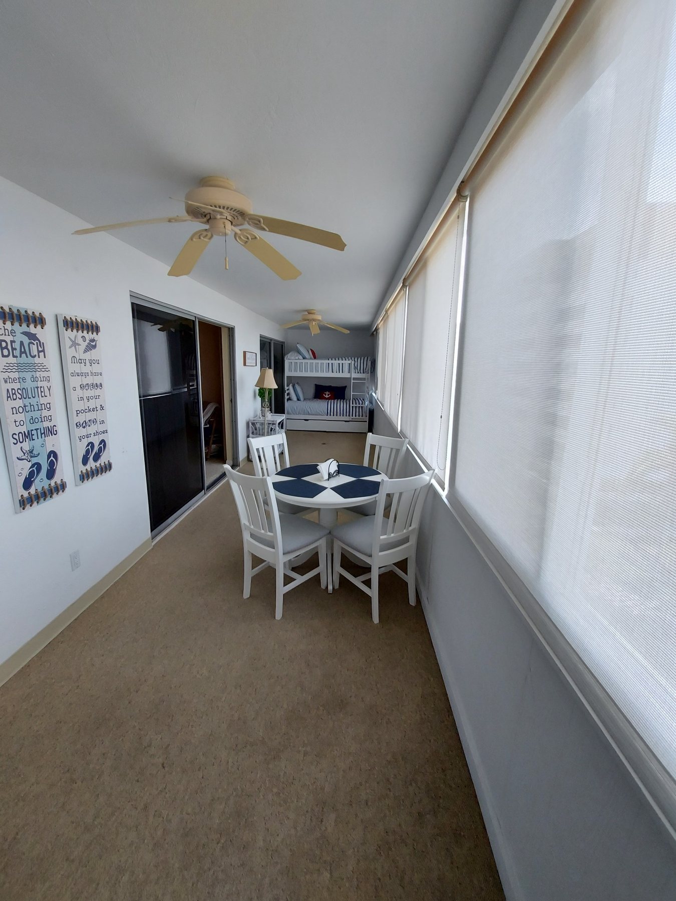 Original enclosed waterfront room reverse view before renovation