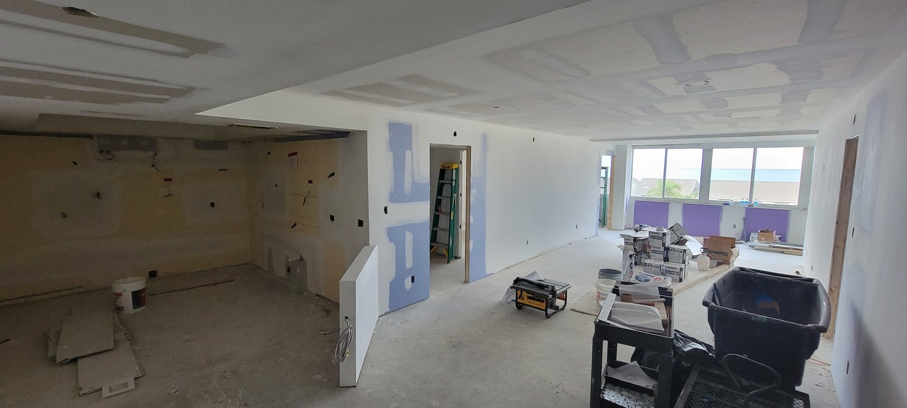Drywall installation and open plan taking shape