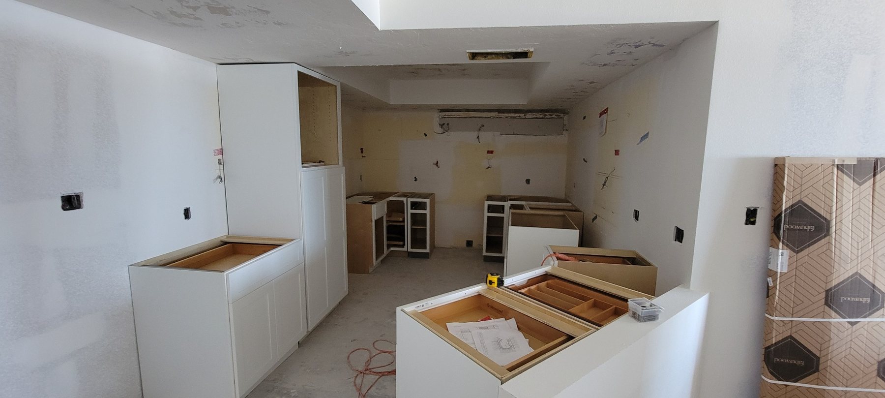 Kitchen cabinetry installation in progress