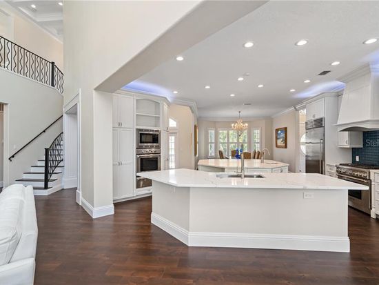 Completed open-concept kitchen viewed from adjoining living area