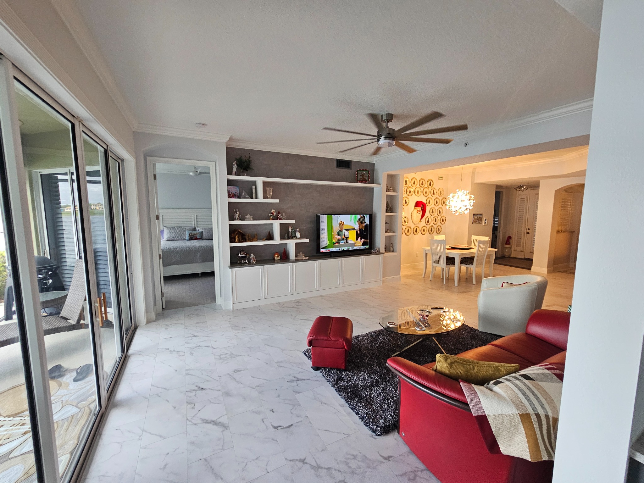 Completed entry transition with custom tile inset and view into living space