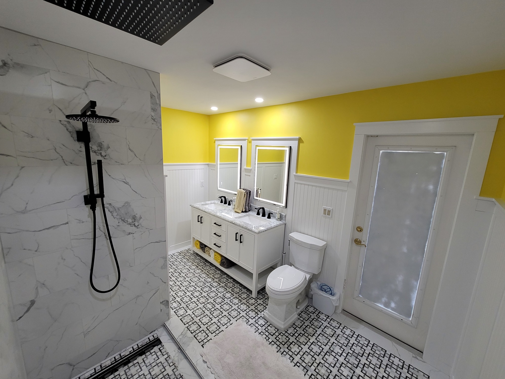 Completed luxury bathroom with matte black shower fixtures