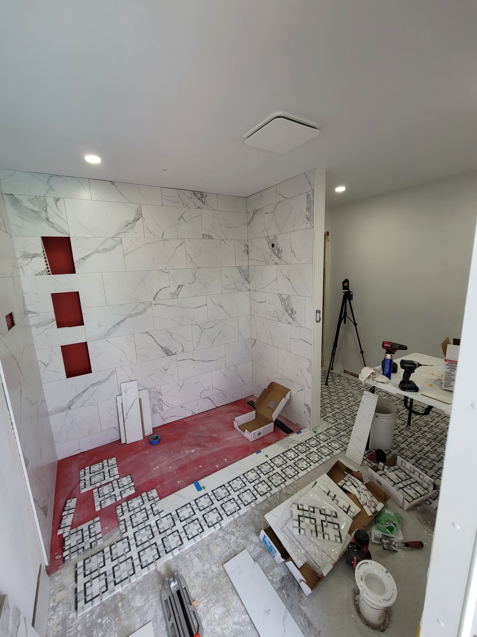 Bathroom floor and shower renovation in progress